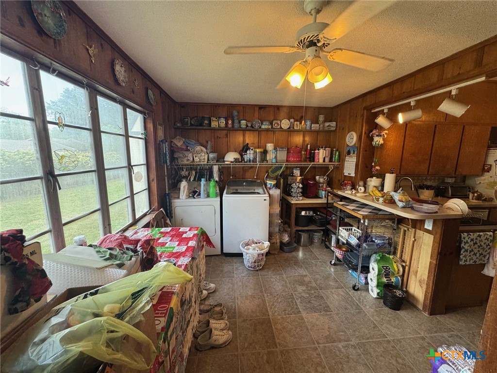 708 East 10th Street Cameron, TX 76520 - Photo 9 of 20 Laundry off the kitchen. Could be a breakfast nook as well.