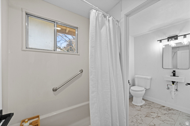 2267 West 4350th Street South Roy, UT 84067 - Photo 19 of 32 Bathroom with toilet and light marble finish floors