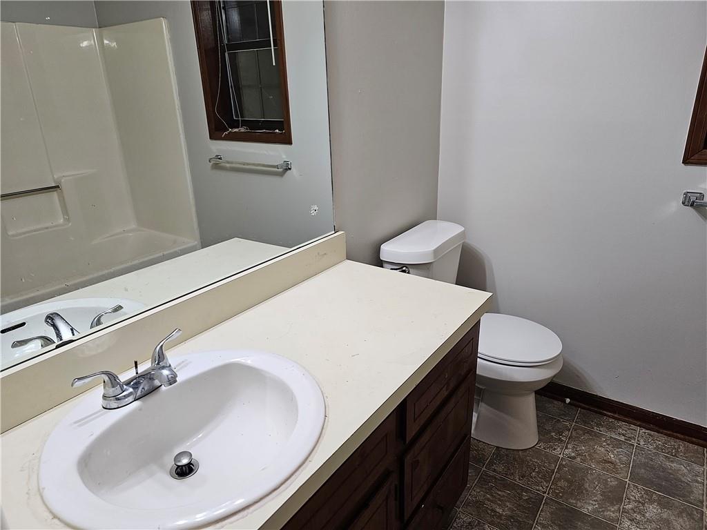 2835 Springdale Road, Unit B Snellville, GA 30039 - Photo 14 of 21 a bathroom with a sink and a toilet