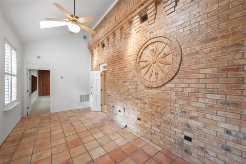 a kitchen with stainless steel appliances granite countertop a stove and a sink