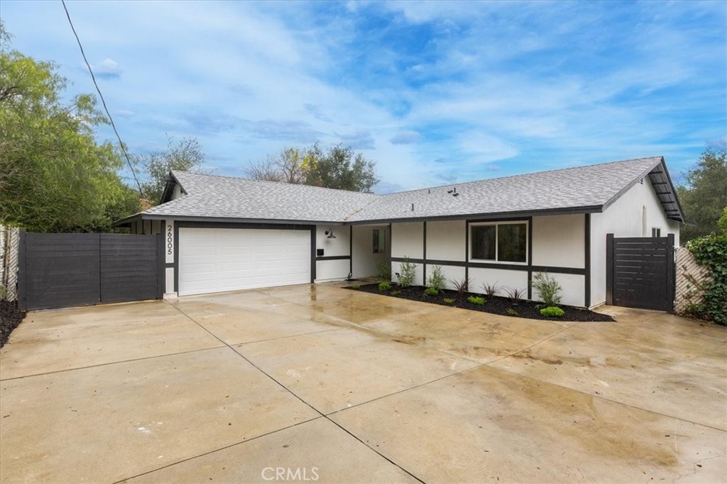 a view of a house with a garage