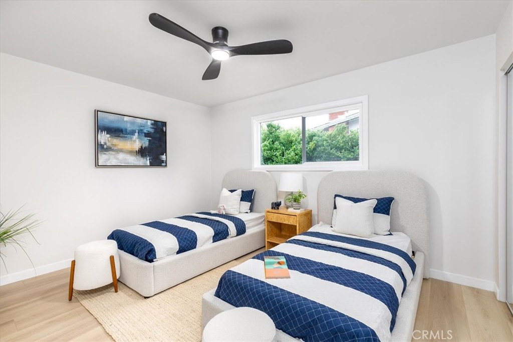 26005 Adamor Road Calabasas, CA 91302 - Photo 19 of 34 a bedroom with furniture and a large window