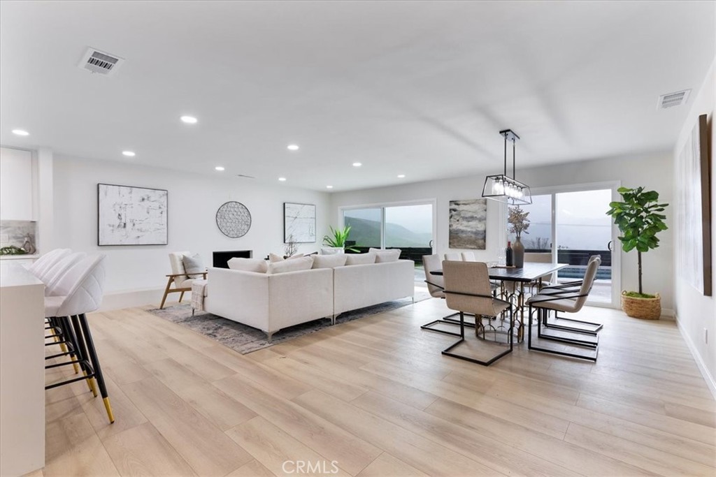 26005 Adamor Road Calabasas, CA 91302 - Photo 4 of 34 a living room with furniture and a chandelier