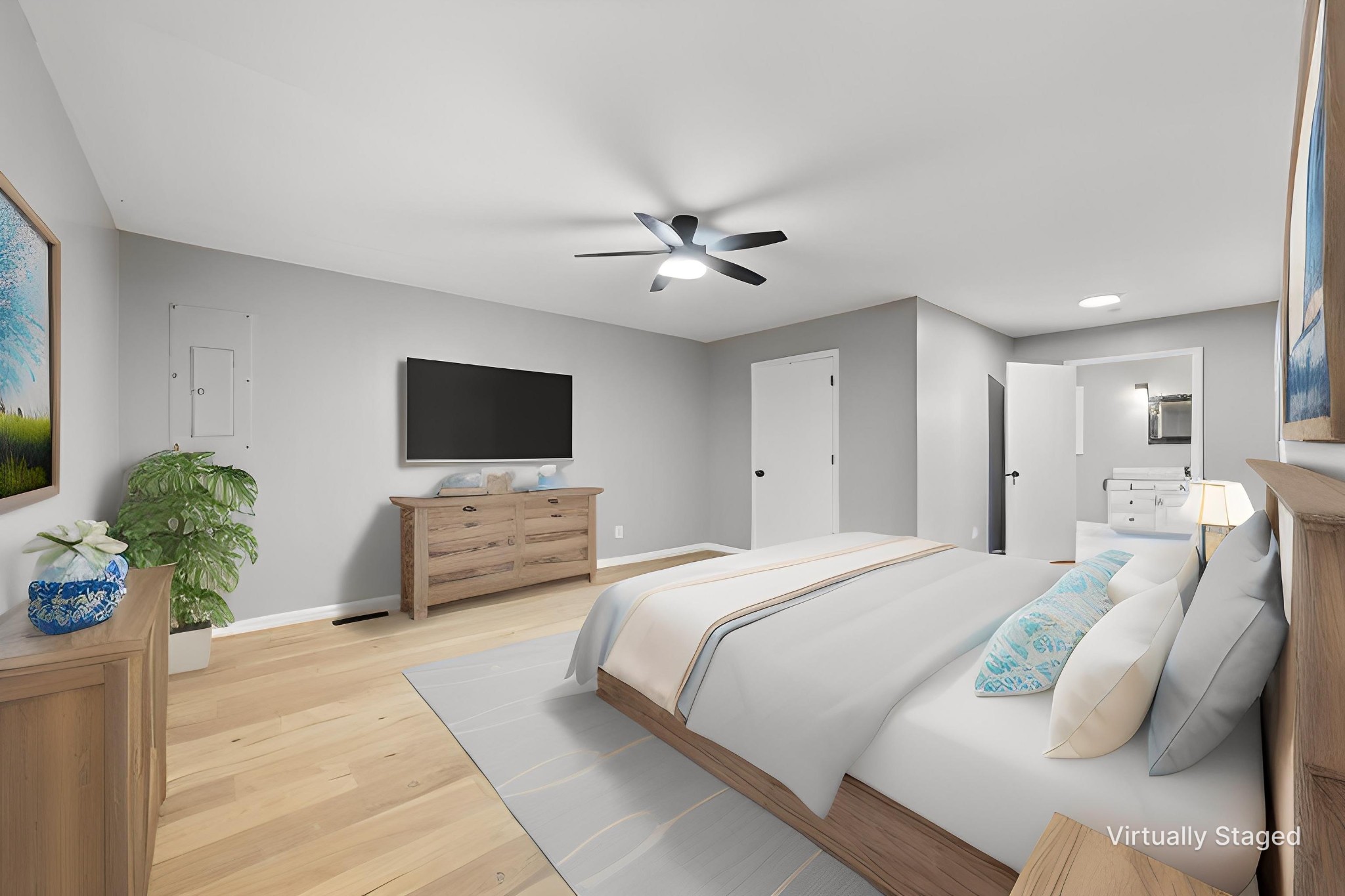 245 South Mill Street Linden, TN 37096 - Photo 12 of 30 a bedroom with a bed and a flat screen tv