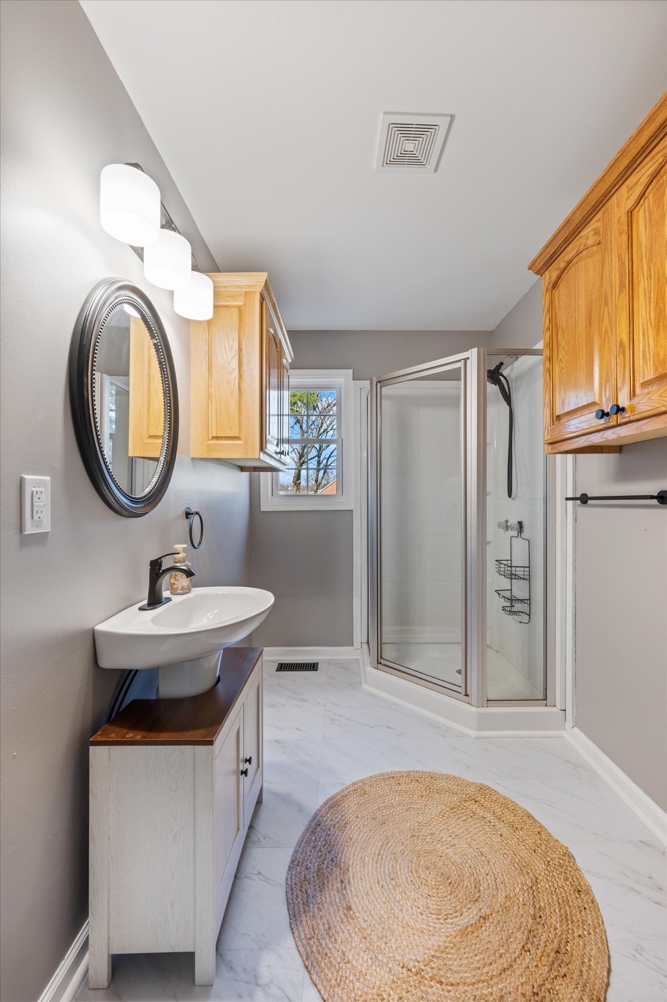245 South Mill Street Linden, TN 37096 - Photo 18 of 30 a bathroom with a sink and a mirror