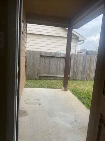 a view of backyard with small cabin