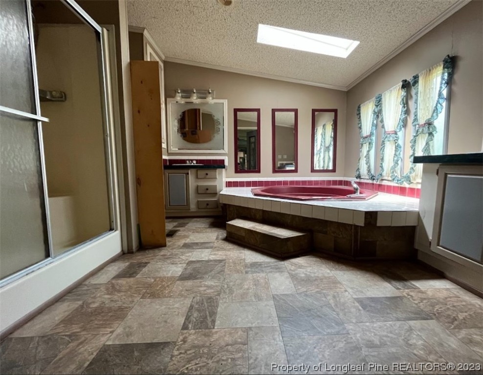 844 Boyd Lake Road Hamlet, NC 28345 - Photo 12 of 21 a room with pool table flat screen tv and windows