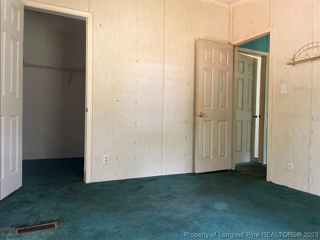 844 Boyd Lake Road Hamlet, NC 28345 - Photo 15 of 21 an empty room with closet area