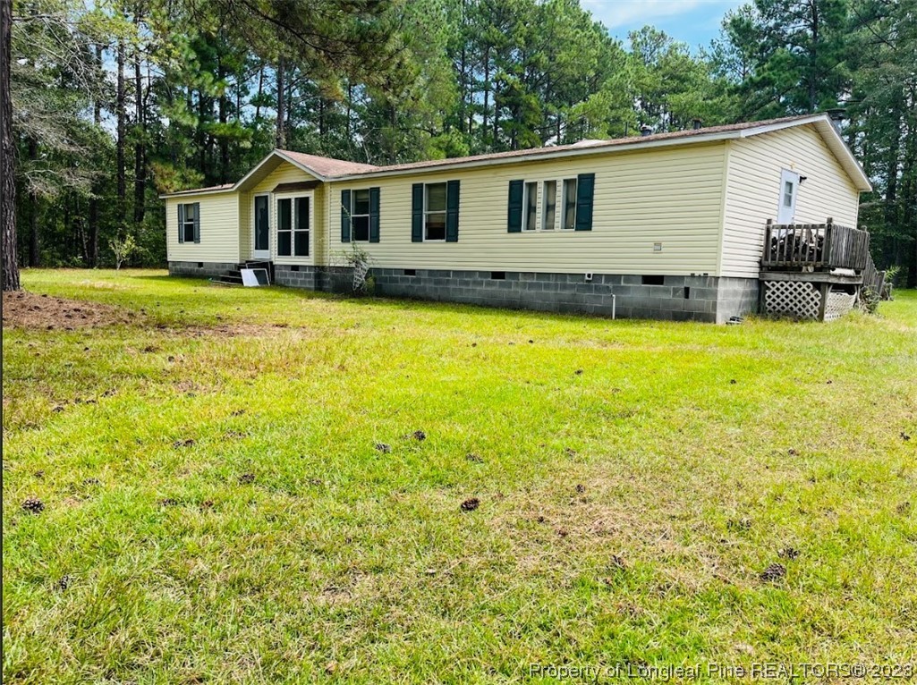 844 Boyd Lake Road Hamlet, NC 28345 - Photo 3 of 21 a front view of a house with yard