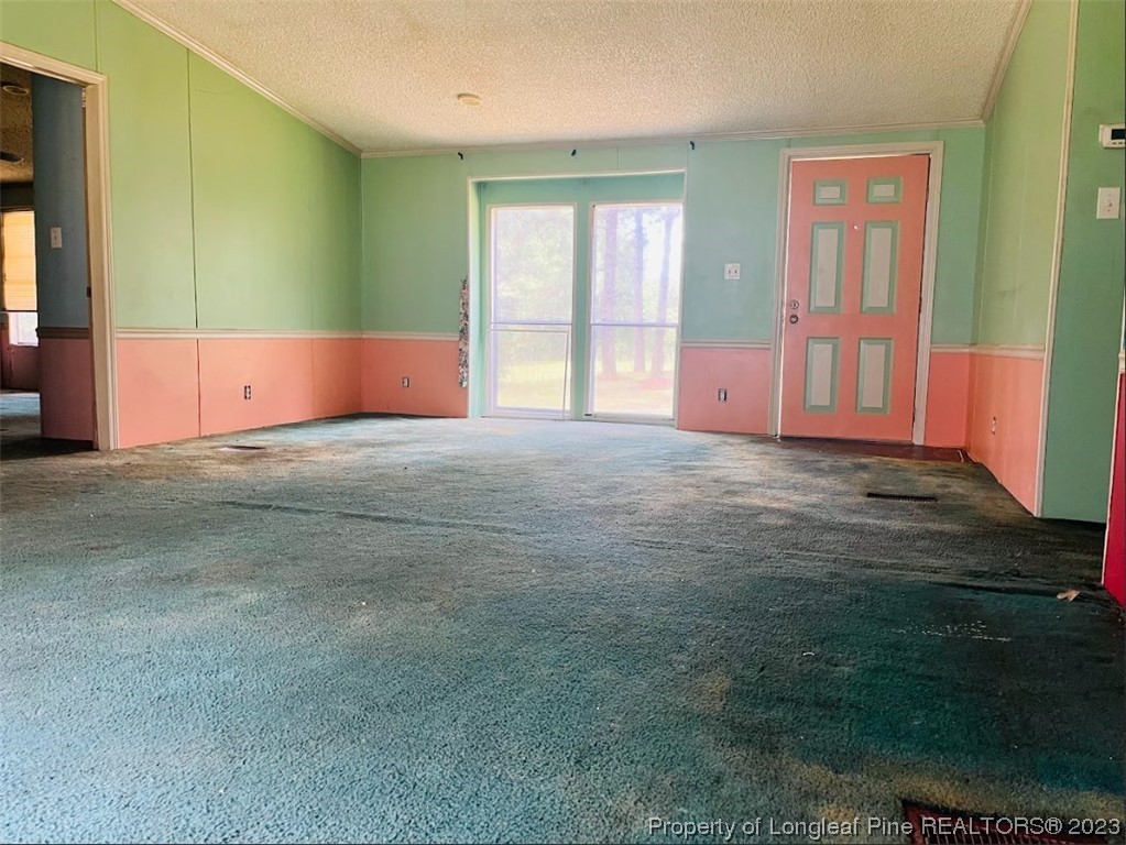 844 Boyd Lake Road Hamlet, NC 28345 - Photo 4 of 21 a big room with windows and closet