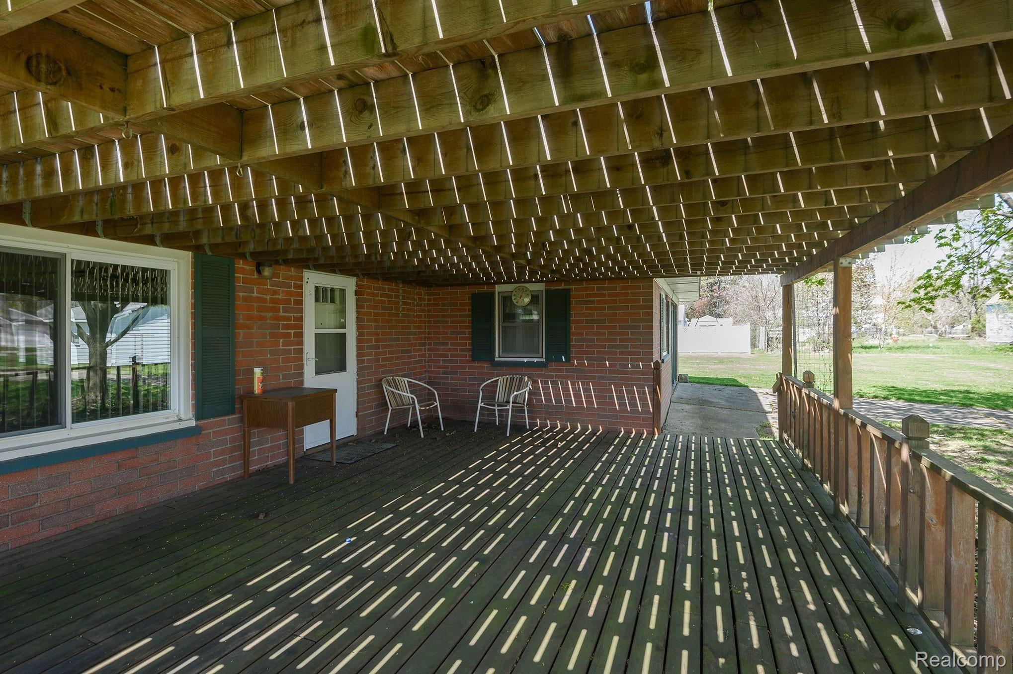 2087 Roland Avenue Flint, MI 48532 - Photo 20 of 22 Huge covered deck