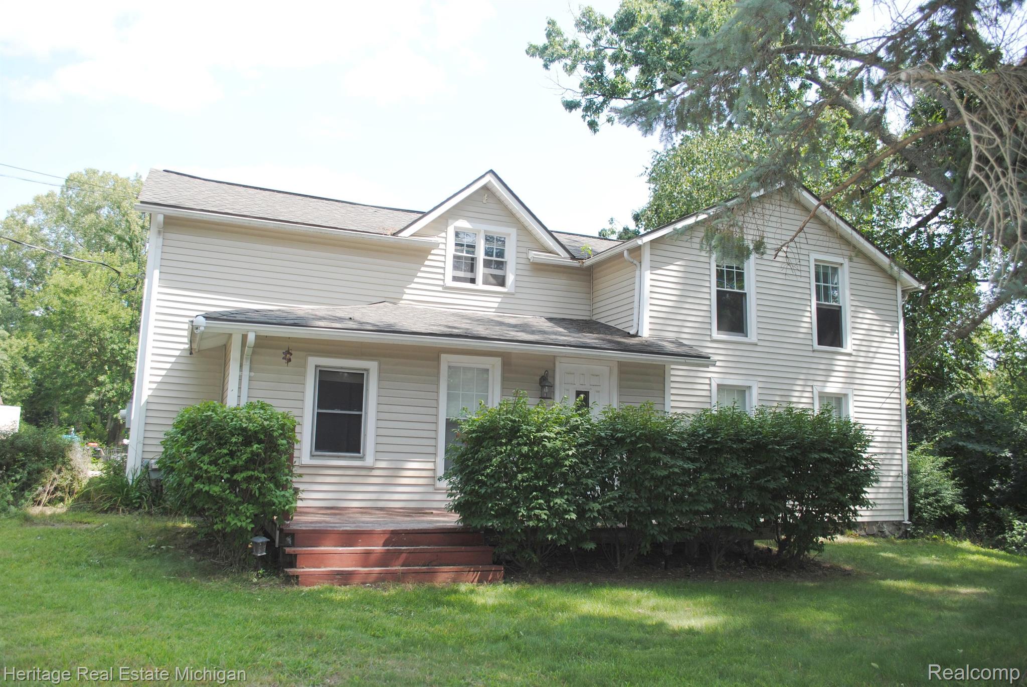 5004 Carroll Lk Road Commerce Township, MI 48382 - Photo 2 of 24 Built in 1930 and offers 4 bedrooms and 3 baths!