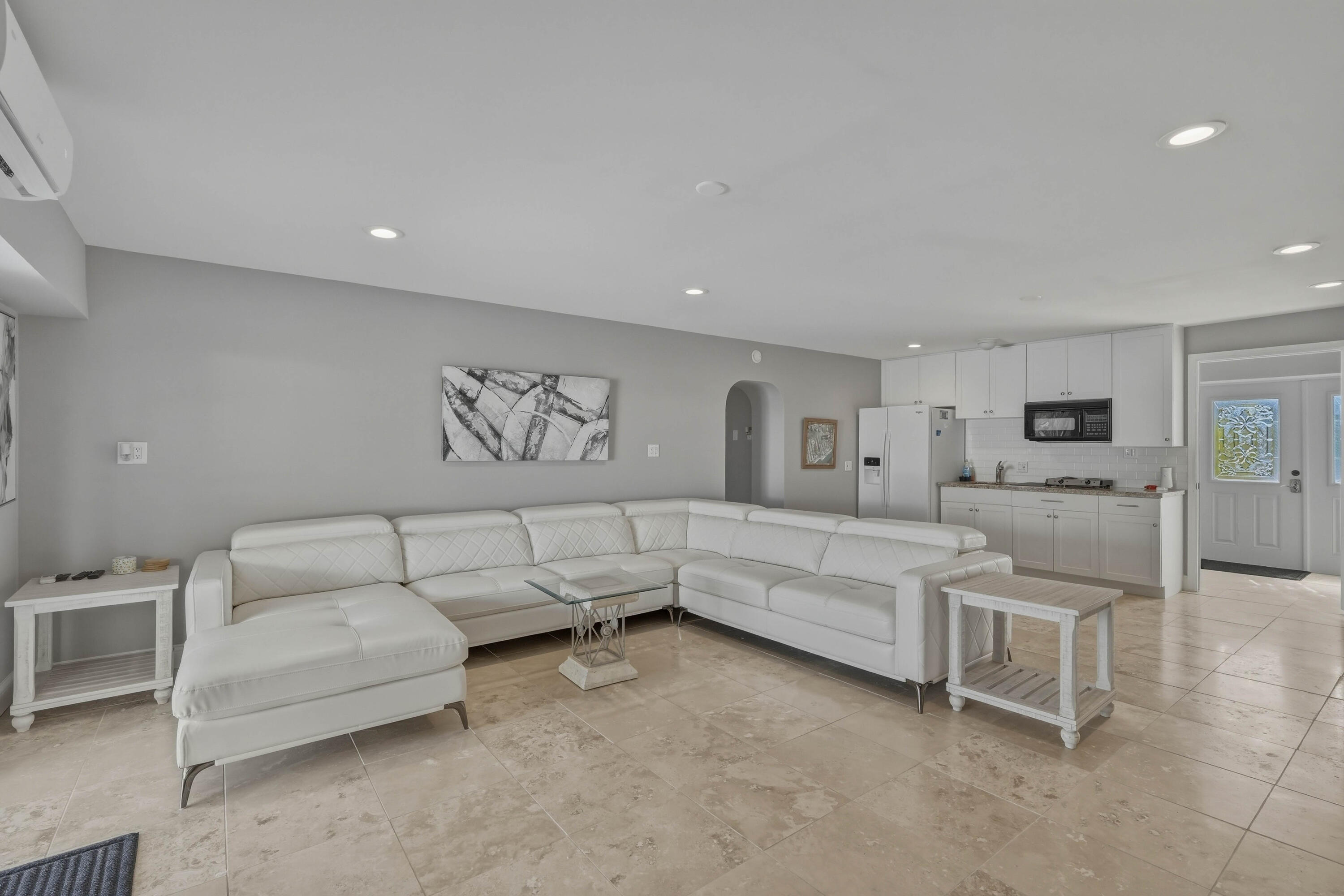 320 5th Street Key Colony Beach, FL 33051 - Photo 33 of 53 a living room with furniture and white walls
