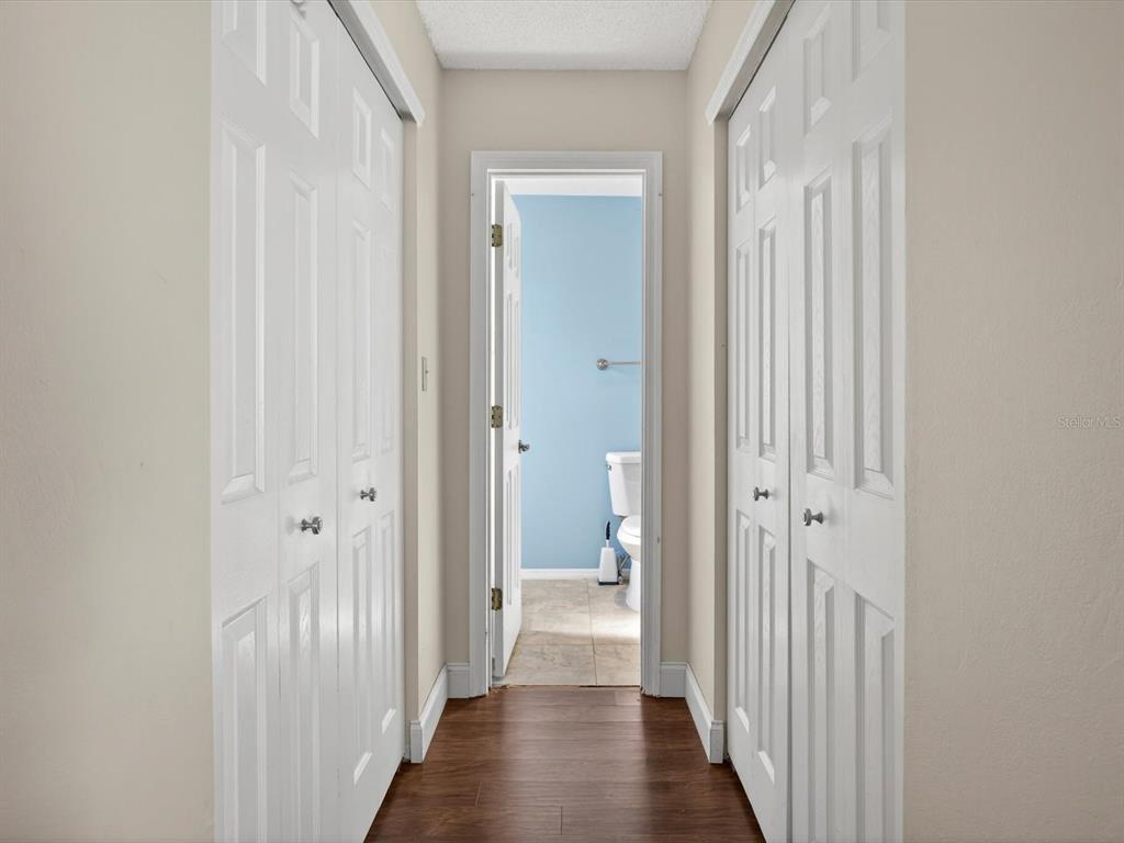 11321 Scenic View Lane Orlando, FL 32821 - Photo 13 of 29 a view of a bathroom from the hallway