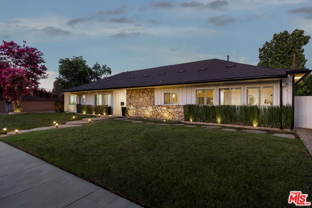 a view of outdoor space yard and front view of a house