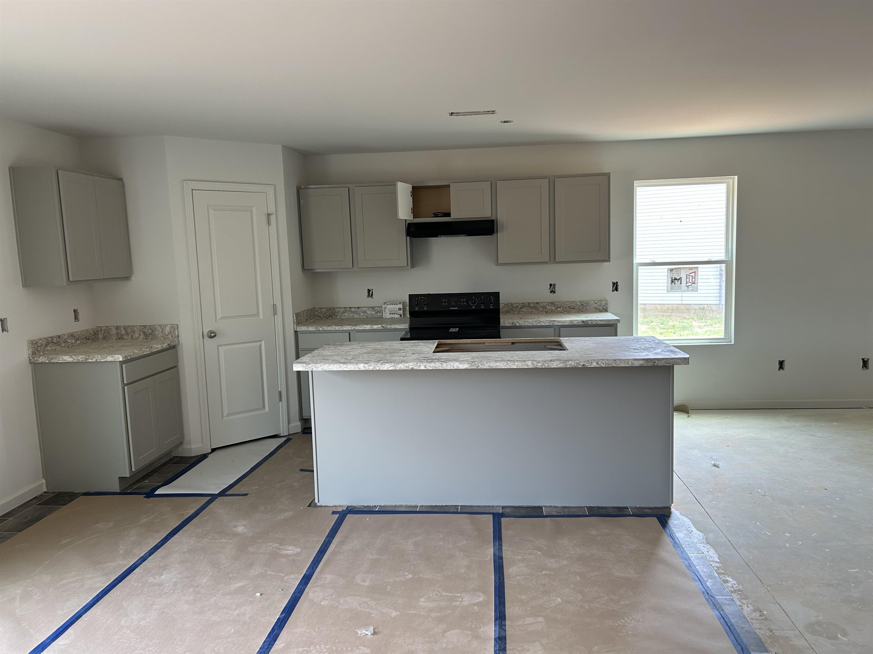 314 Riley Way Spring Hope, NC 27882 - Photo 4 of 42 a close view of kitchen with a sink a microwave and cabinets