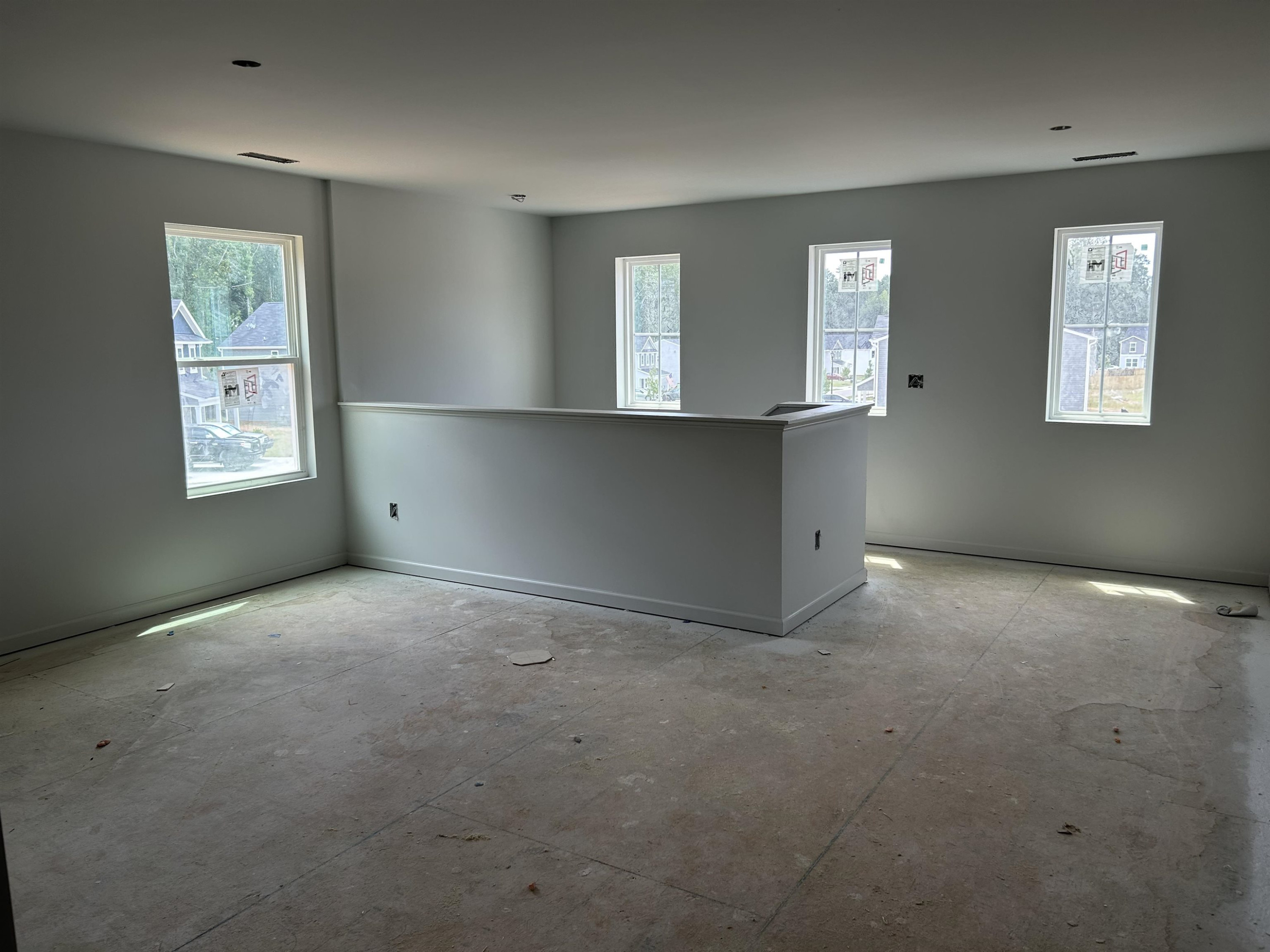 314 Riley Way Spring Hope, NC 27882 - Photo 10 of 42 an empty room with windows