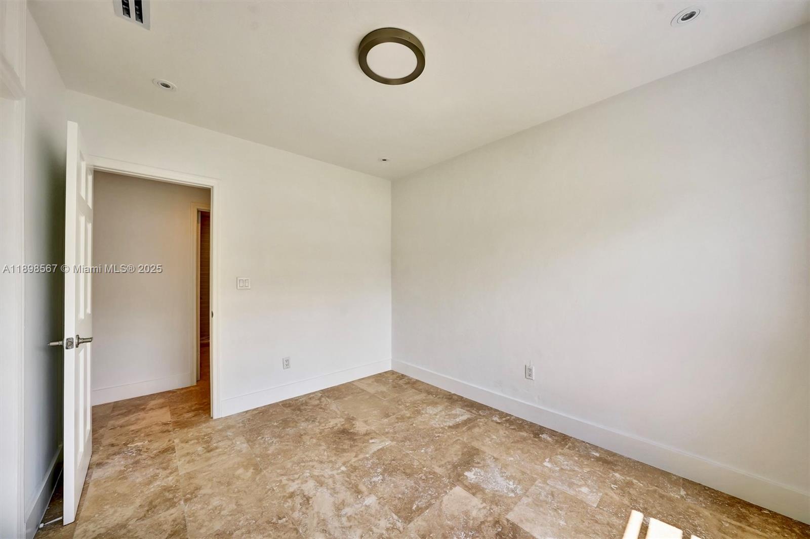 255 Ridgewood Road Key Biscayne, FL 33149 - Photo 27 of 55 a view of empty room