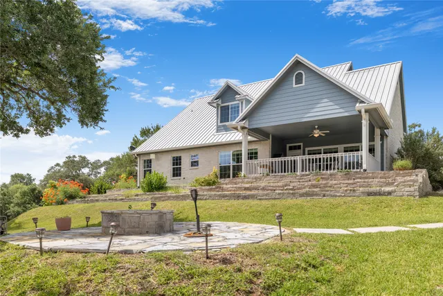 a house with a tree in front of it