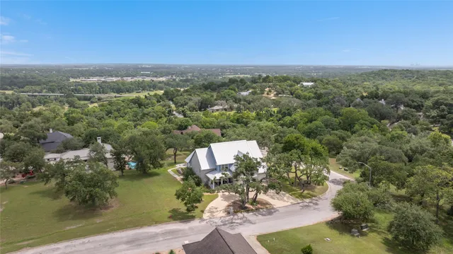 an aerial view of a city with lots of residential buildings