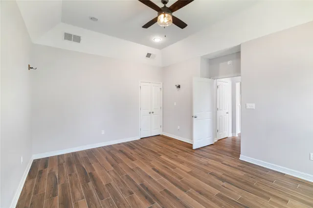 a bathroom with a tub sink and toilet