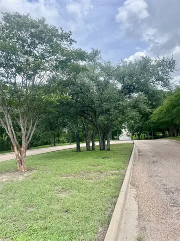 a view of outdoor space with deck and yard