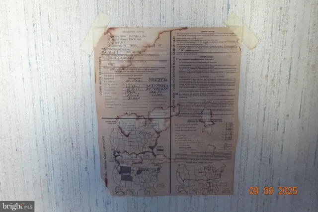 a bathroom with a shower and mirror