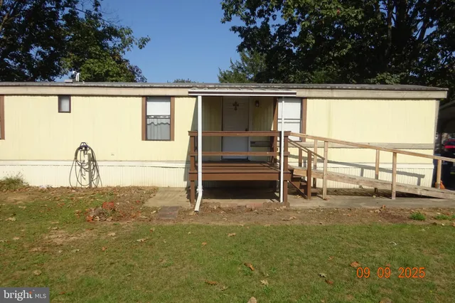 a view of a back yard of the building