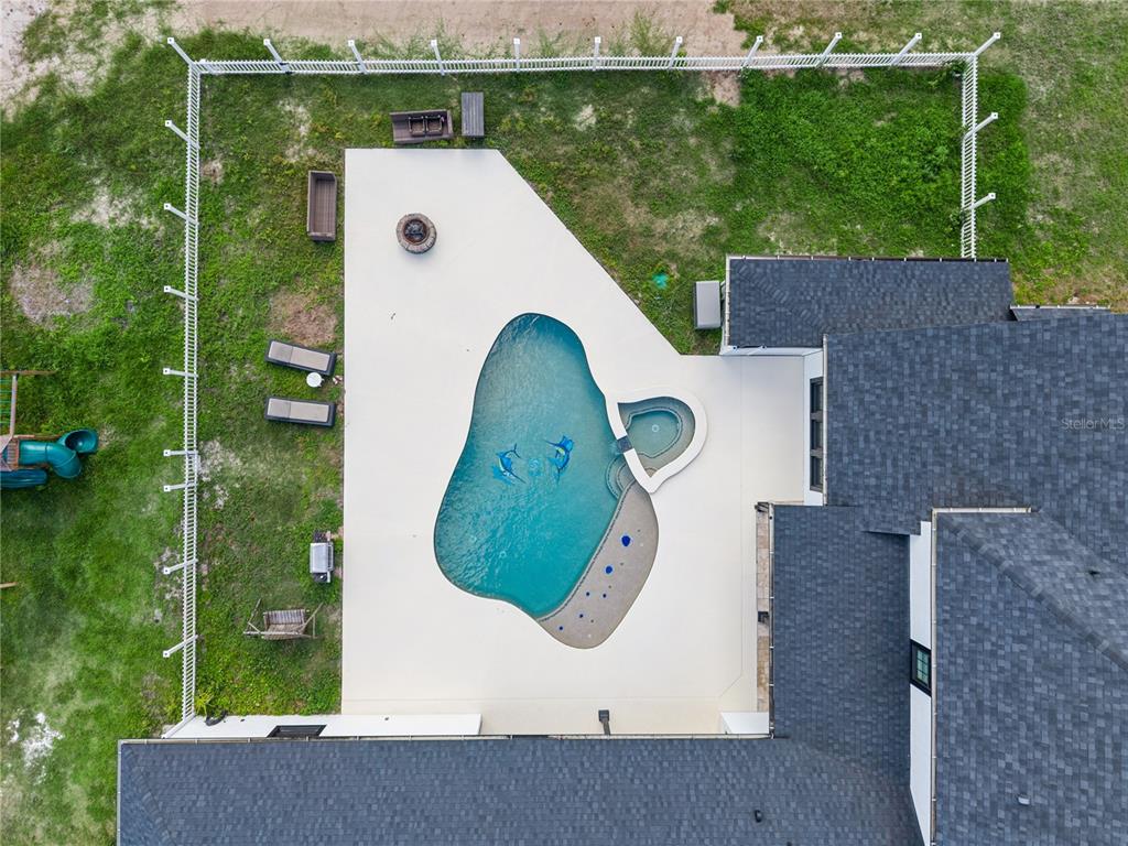 345 Cypress Isles Road Osteen, FL 32764 - Photo 31 of 41 an aerial view of a house with a garden
