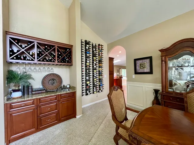 a view of a balcony with furniture
