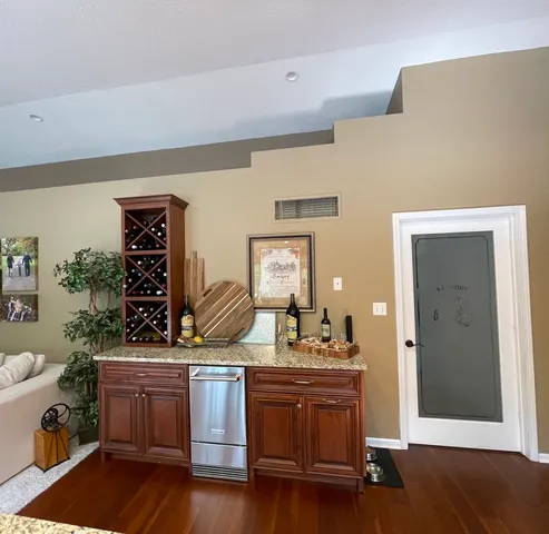 a view of a livingroom with furniture and a fireplace