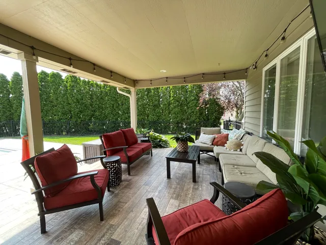 a outdoor living space with furniture and garden view