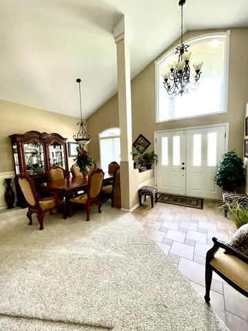 a view of a workspace with furniture