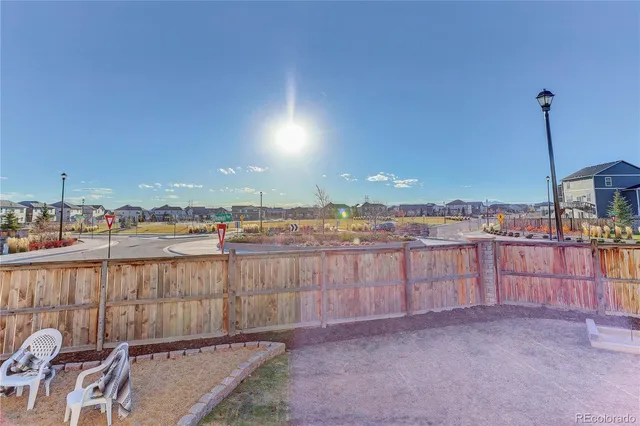 a view of a balcony with furniture