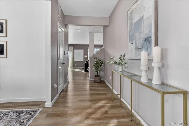 a view of a bathroom with a sink and a glass door