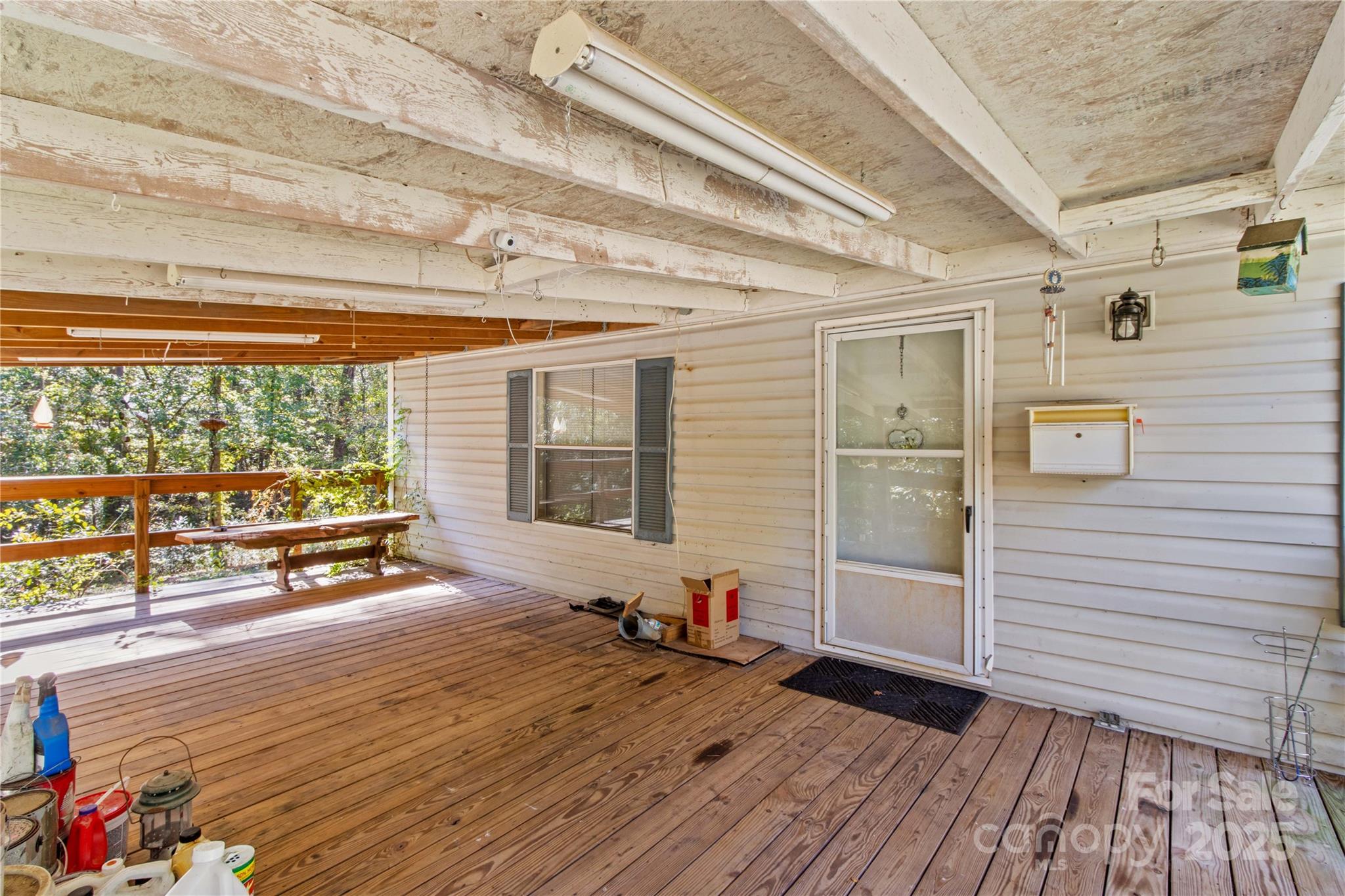 174 Ranch Way Mocksville, NC 27028 - Photo 4 of 27 a view of a room with wooden floor and windows