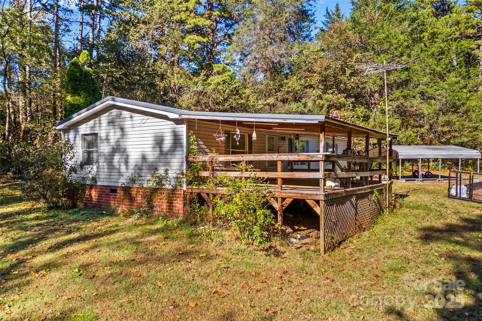 174 Ranch Way Mocksville, NC 27028 - Photo 6 of 27 a view of a house with pool and sitting area