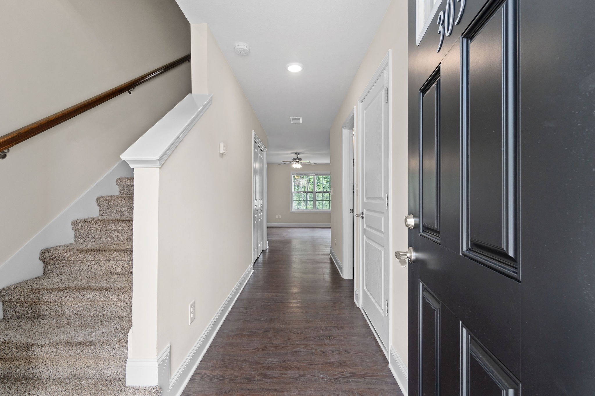 1552 Tylertown Road, Unit 104 Clarksville, TN 37040 - Photo 4 of 21 a view of a hallway with wooden floor