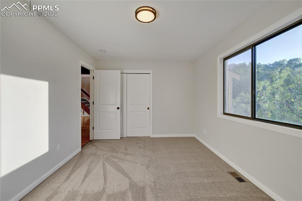 9 Sutherland Road Manitou Springs, CO 80829 - Photo 17 of 31 a view of a livingroom with a dishwasher and a window