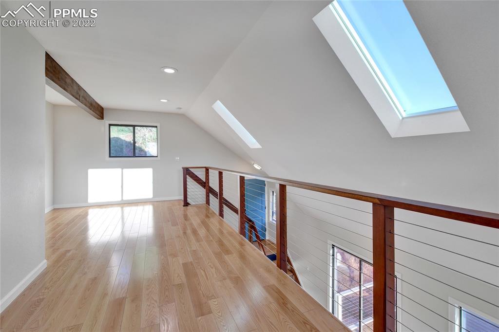 9 Sutherland Road Manitou Springs, CO 80829 - Photo 20 of 31 a view of empty room with wooden floor and fan