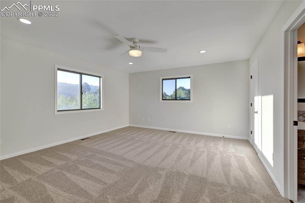 9 Sutherland Road Manitou Springs, CO 80829 - Photo 21 of 31 an empty room with windows and closet