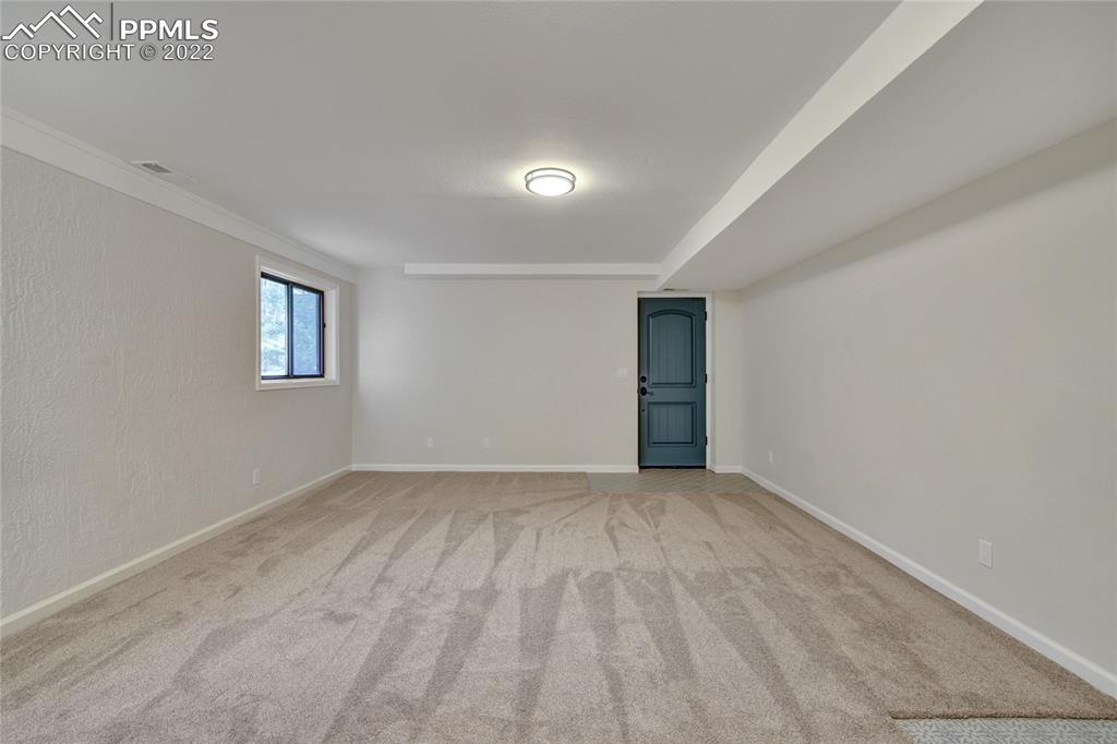 9 Sutherland Road Manitou Springs, CO 80829 - Photo 26 of 31 a view of an empty room with a window