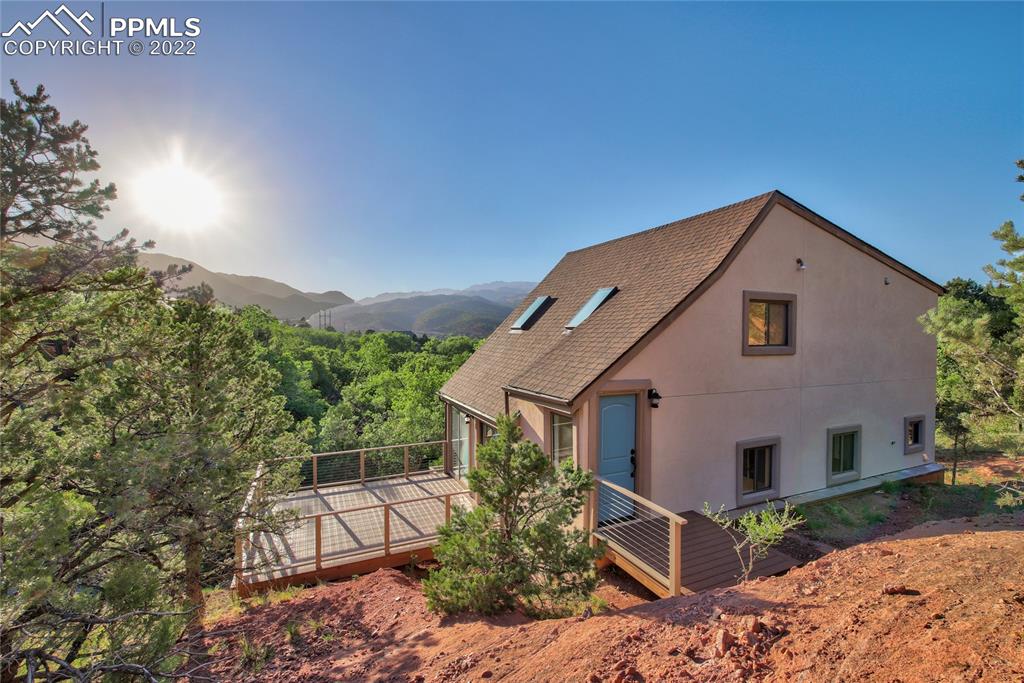 9 Sutherland Road Manitou Springs, CO 80829 - Photo 30 of 31 a front view of a house with a yard