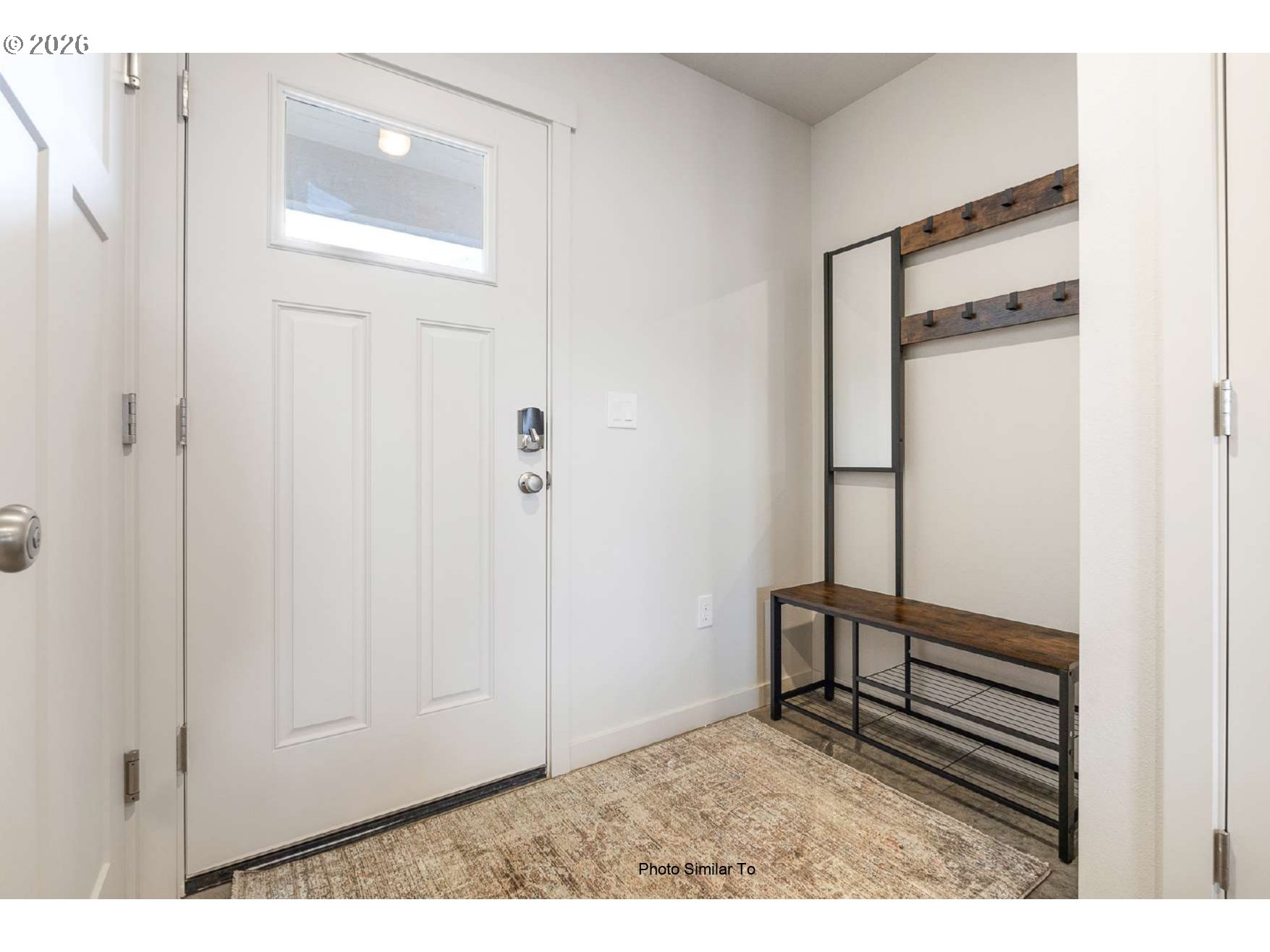 1104 Northeast 11th Street Hermiston, OR 97838 - Photo 11 of 19 a view of a hallway with wooden floor and closet