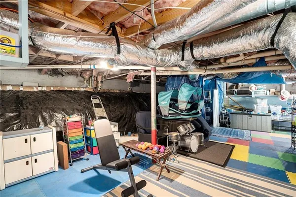a room with lots of different colored cloths