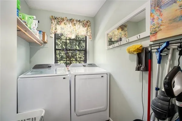 a utility room with dryer and washer