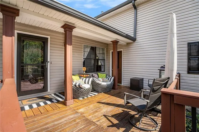 a view of a patio with chairs and tables