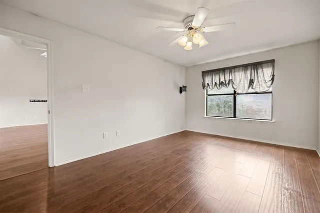 a view of storage and utility room with closet