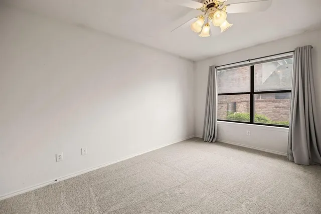 a view of a livingroom with wooden floor