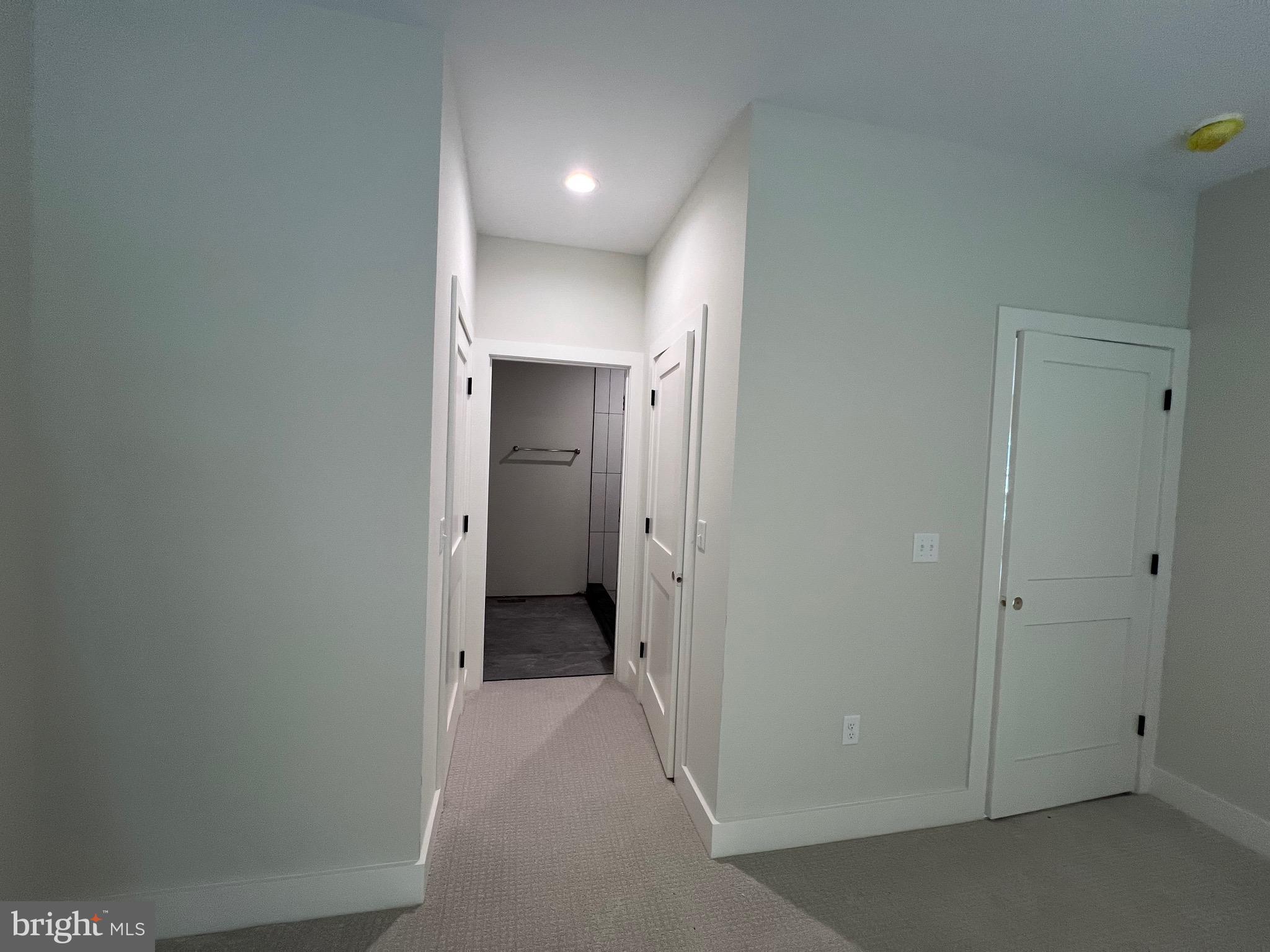 175 Rose Way Colonial Beach, VA 22443 - Photo 17 of 33 a view of a hallway with wooden shelves
